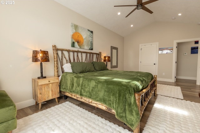 bedroom featuring recessed lighting, vaulted ceiling, baseboards, and wood finished floors