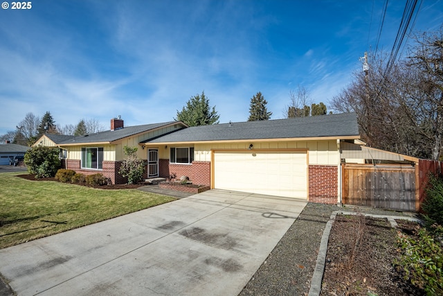 ranch-style home with a garage and a front lawn