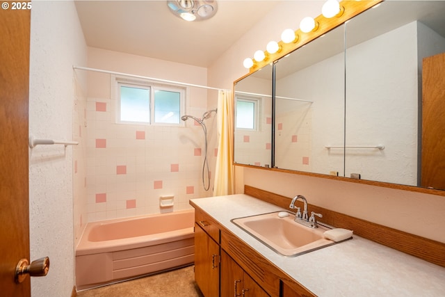 bathroom with vanity and shower / bath combo with shower curtain