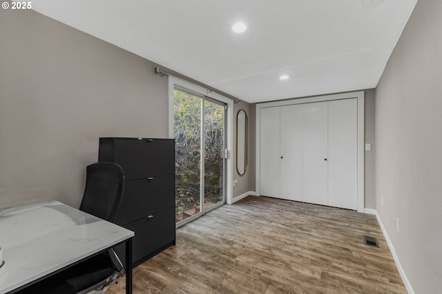 office area with dark hardwood / wood-style floors