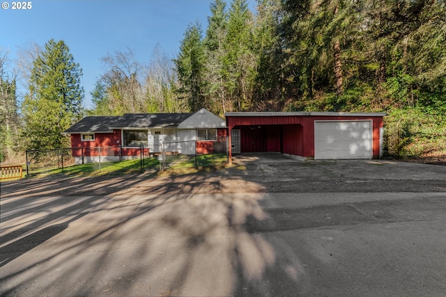 ranch-style house featuring a garage