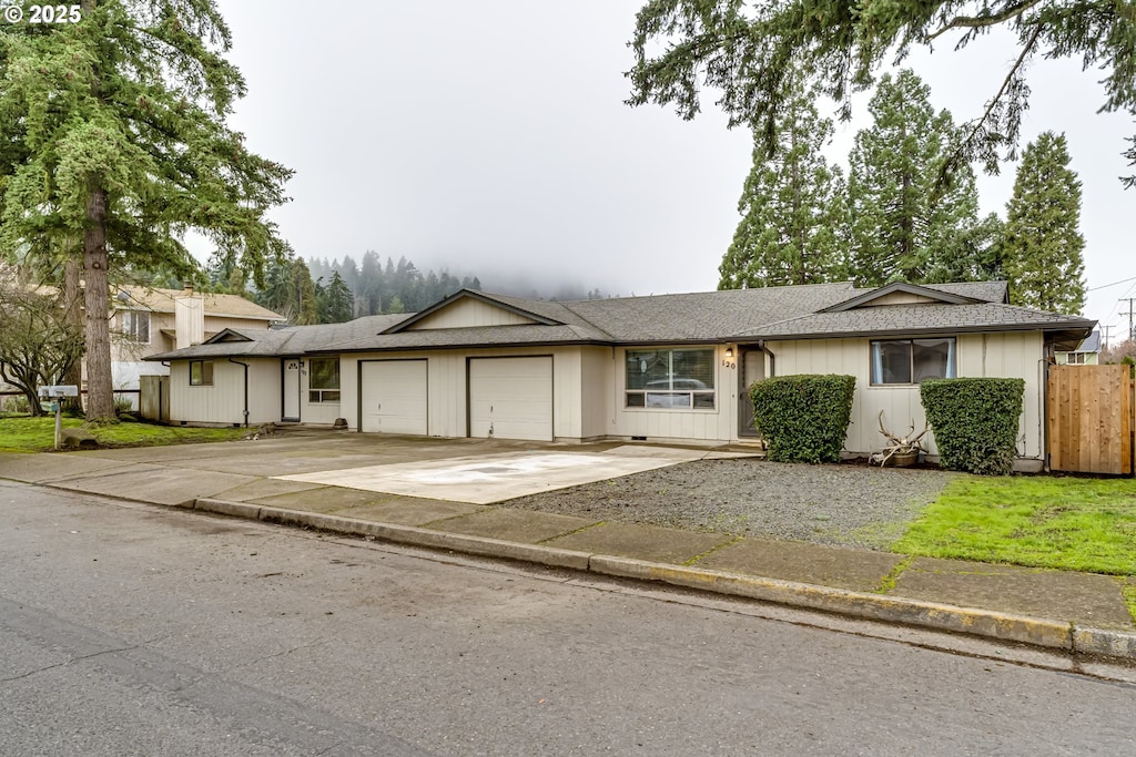 ranch-style home with a garage