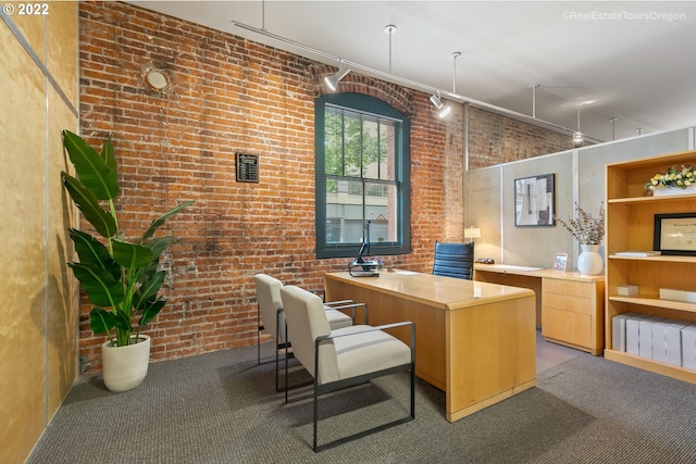 1325 NW Flanders St, Portland, OR 97209 - carpeted office space with brick wall and track lighting