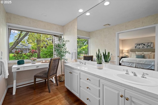 31560 SW Arbor Glen Loop, Wilsonville, OR 97070 - ensuite bathroom featuring a sink, ensuite bathroom, double vanity, and wood finished floors
