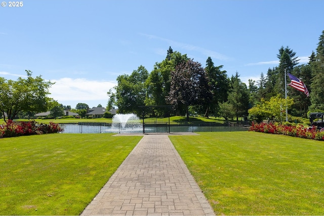 31560 SW Arbor Glen Loop, Wilsonville, OR 97070 - view of home's community featuring a lawn, a water view, and fence