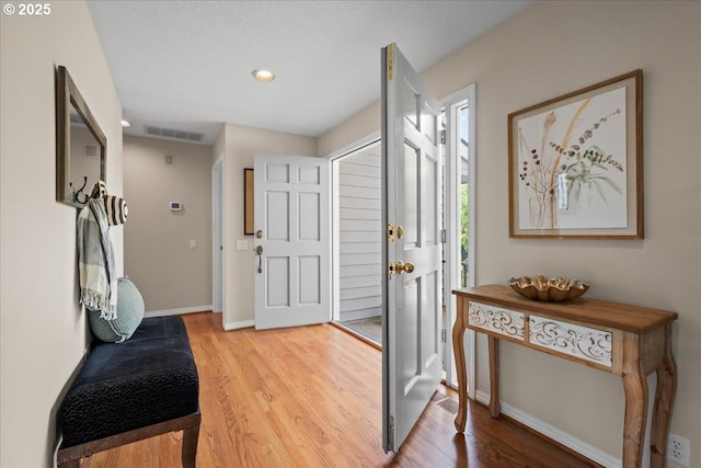 31560 SW Arbor Glen Loop, Wilsonville, OR 97070 - foyer with baseboards, recessed lighting, wood finished floors, and visible vents