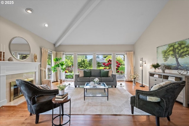 31560 SW Arbor Glen Loop, Wilsonville, OR 97070 - living room featuring plenty of natural light, a tile fireplace, high vaulted ceiling, and beamed ceiling