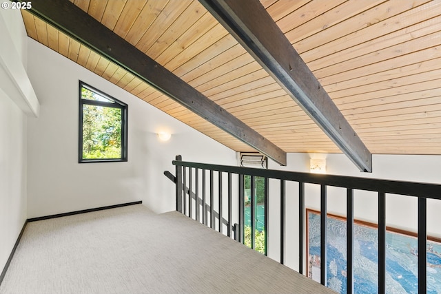 bonus room with wood ceiling, carpet flooring, and baseboards