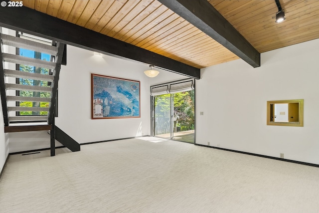 common area featuring wood ceiling and beam ceiling