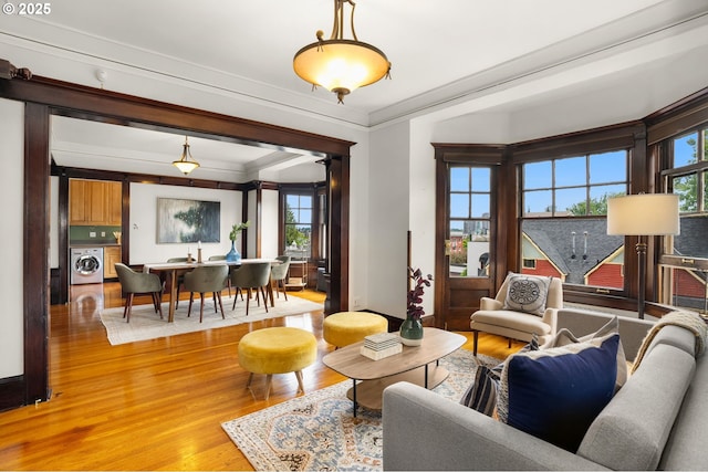 2083 NW Johnson St Unit 45, Portland, OR 97209 - living room with light wood-style flooring and ornamental molding