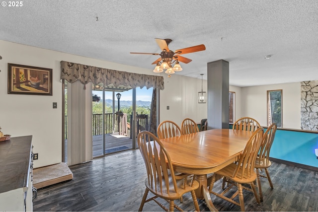 331 Hemlock Ln, Roseburg, OR 97471 - dining room with dark wood-style flooring, visible vents, ceiling fan, and a textured ceiling