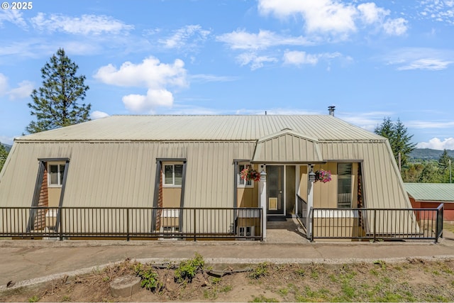 331 Hemlock Ln, Roseburg, OR 97471 - doorway to property with a porch and board and batten siding