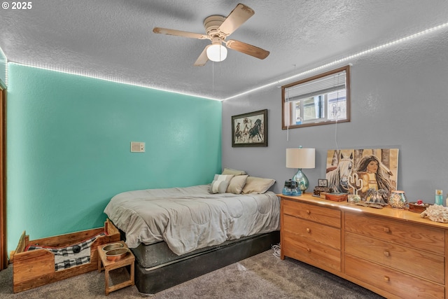 331 Hemlock Ln, Roseburg, OR 97471 - carpeted bedroom with a textured ceiling and a ceiling fan