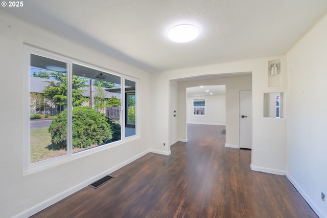 562 Gatch St, Woodburn, OR 97071 - empty room with wood finished floors and baseboards