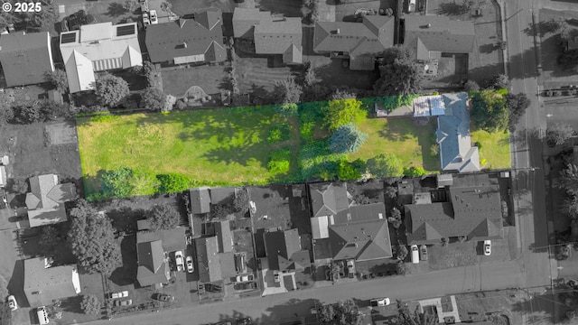 562 Gatch St, Woodburn, OR 97071 - aerial perspective of suburban area with property boundaries highlighted