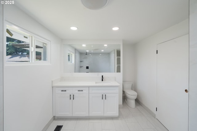 562 Gatch St, Woodburn, OR 97071 - full bath with vanity, recessed lighting, a walk in shower, and marble look tile flooring