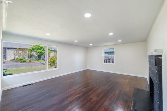 562 Gatch St, Woodburn, OR 97071 - unfurnished living room with wood finished floors and recessed lighting