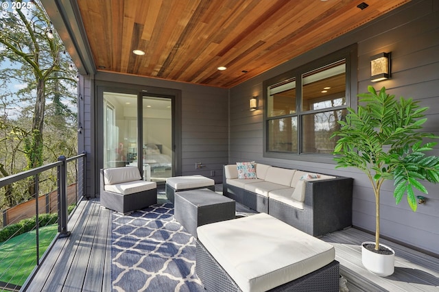 wooden terrace featuring an outdoor hangout area