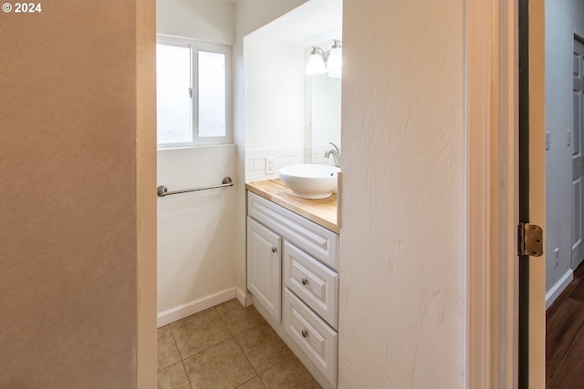 127 Roan Dr, Eugene, OR 97401 - bathroom with vanity, tile patterned floors, and baseboards