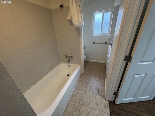 127 Roan Dr, Eugene, OR 97401 - bathroom with toilet, baseboards, tile patterned flooring, shower / bathtub combination, and vanity