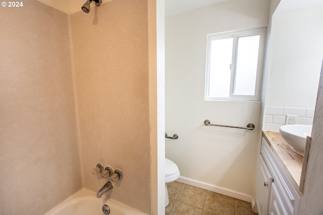 127 Roan Dr, Eugene, OR 97401 - bathroom with toilet, vanity, tile patterned floors, washtub / shower combination, and baseboards