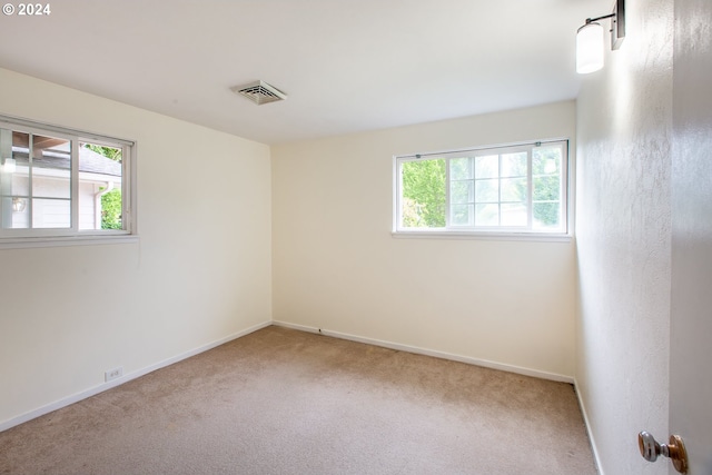 127 Roan Dr, Eugene, OR 97401 - unfurnished room featuring plenty of natural light, carpet floors, and baseboards