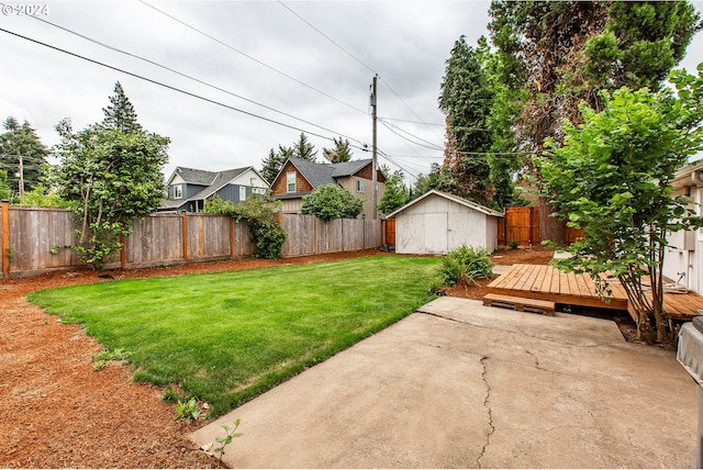 127 Roan Dr, Eugene, OR 97401 - view of yard featuring a patio area and a wooden deck