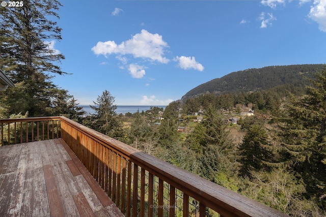 213 University Ave, Manzanita, OR 97130 - wooden deck with a mountain view and a view of trees