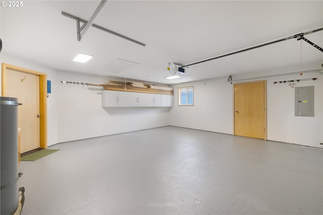 213 University Ave, Manzanita, OR 97130 - garage with electric panel, secured water heater, and a garage door opener