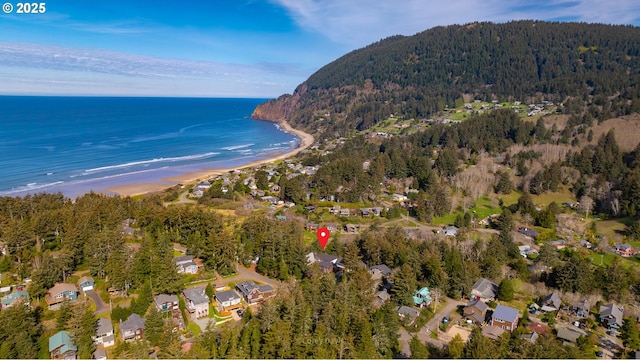 213 University Ave, Manzanita, OR 97130 - drone / aerial view featuring a view of trees, a view of the beach, and a water and mountain view