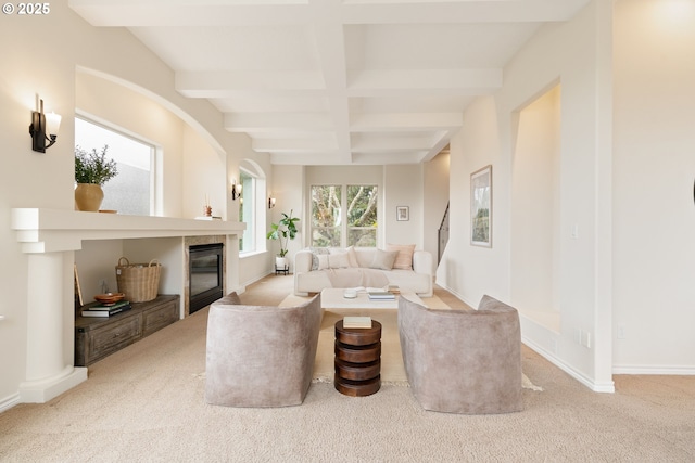 230 SW Florida St, Portland, OR 97219 - living area with beam ceiling, carpet flooring, a glass covered fireplace, and coffered ceiling