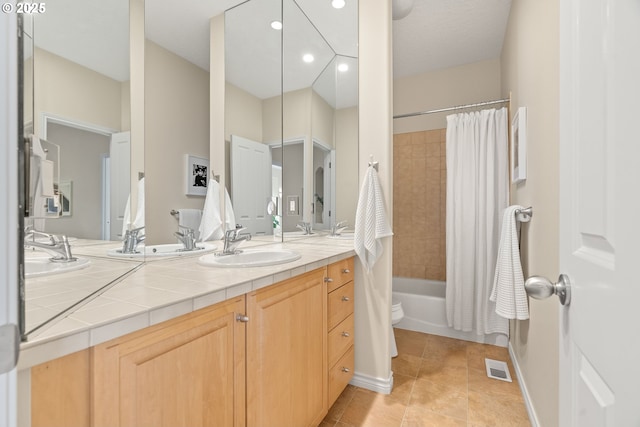 230 SW Florida St, Portland, OR 97219 - full bathroom with double vanity, tile patterned flooring, shower / bath combination with curtain, and recessed lighting