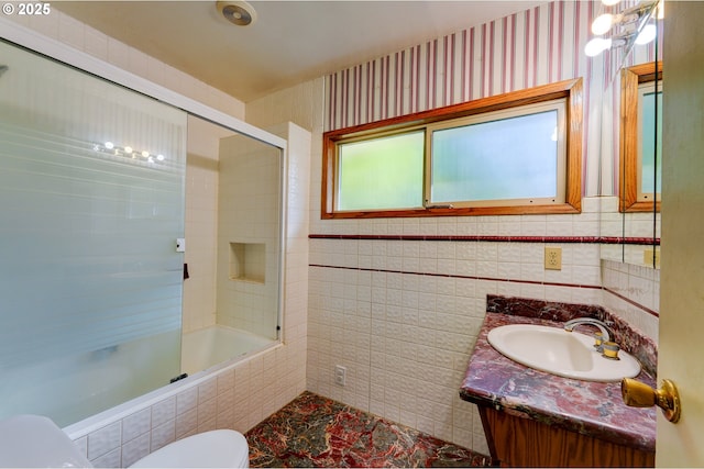 6620 SE Barbara Welch Rd, Portland, OR 97236 - full bathroom with combined bath / shower with glass door, vanity, and tile walls