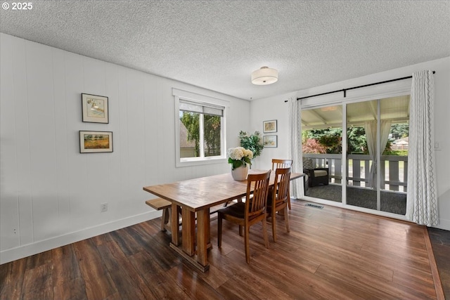 1941 NE 143rd Ave, Portland, OR 97230 - dining space with dark wood-type flooring and a textured ceiling
