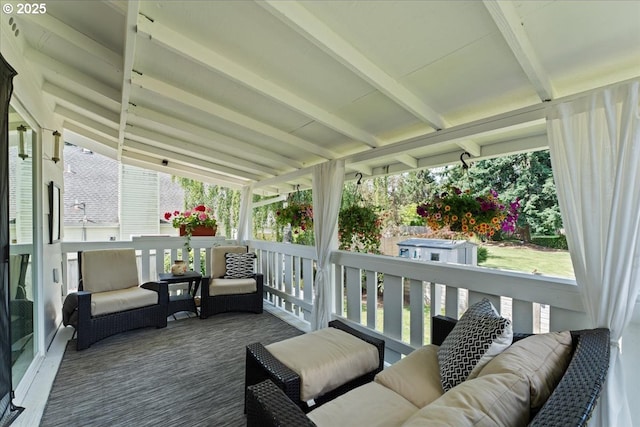 1941 NE 143rd Ave, Portland, OR 97230 - sunroom with healthy amount of natural light, an outdoor living space, and beam ceiling