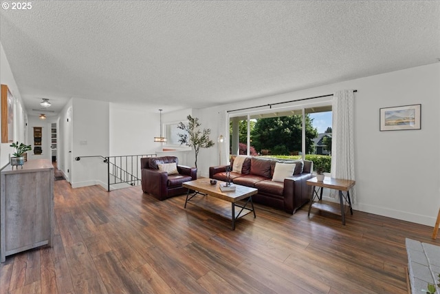 1941 NE 143rd Ave, Portland, OR 97230 - living area featuring a textured ceiling and wood finished floors
