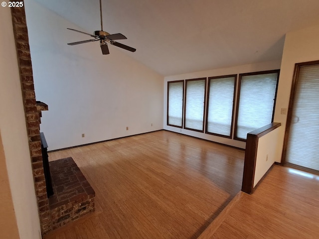 unfurnished living room with ceiling fan, light hardwood / wood-style flooring, and lofted ceiling