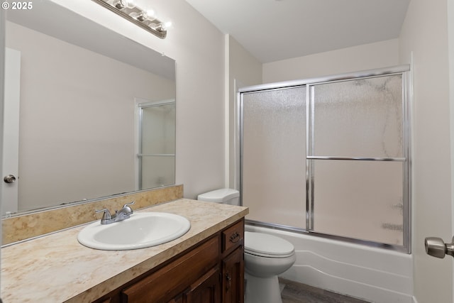 818 Chehalis Pl, Keizer, OR 97303 - bathroom featuring toilet, vanity, and shower / bath combination with glass door