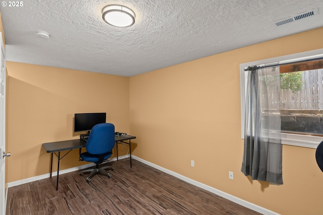818 Chehalis Pl, Keizer, OR 97303 - home office featuring wood finished floors, baseboards, and a textured ceiling