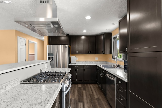 818 Chehalis Pl, Keizer, OR 97303 - kitchen with stainless steel appliances, a sink, wall chimney exhaust hood, dark wood-style floors, and a textured ceiling
