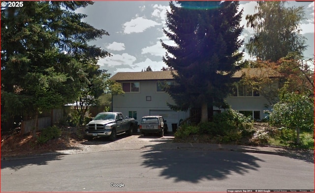 818 Chehalis Pl, Keizer, OR 97303 - obstructed view of property featuring an attached garage and concrete driveway