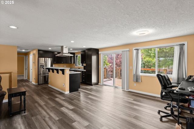 818 Chehalis Pl, Keizer, OR 97303 - office area with dark wood-style flooring, baseboards, a textured ceiling, and recessed lighting