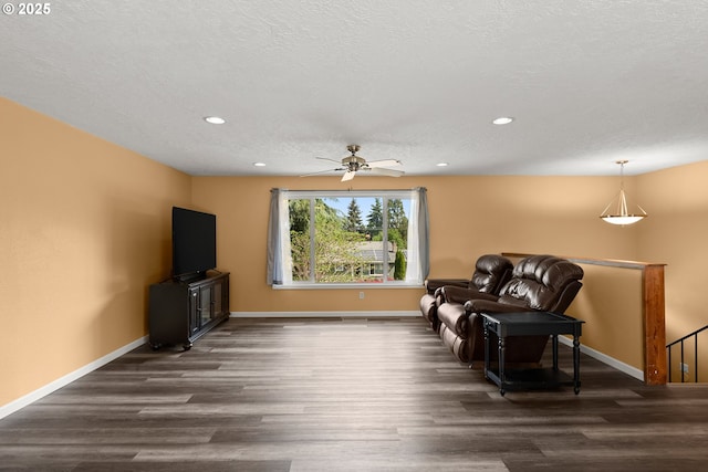818 Chehalis Pl, Keizer, OR 97303 - sitting room with an upstairs landing, dark wood-type flooring, baseboards, ceiling fan, and recessed lighting