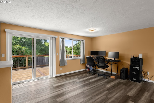 818 Chehalis Pl, Keizer, OR 97303 - office space with wood finished floors, a textured ceiling, plenty of natural light, and baseboards