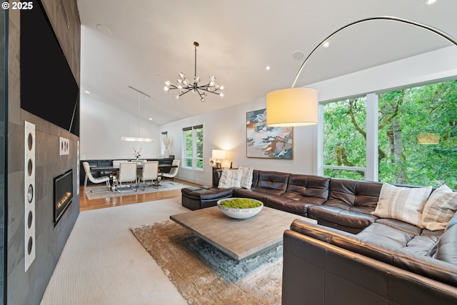 1311 NW 5th Ave, Camas, WA 98607 - living area featuring vaulted ceiling, a chandelier, a large fireplace, and recessed lighting