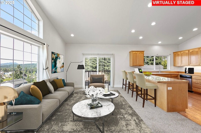 1590 Cottage Heights Loop, Cottage Grove, OR 97424 - living room with recessed lighting, light carpet, a mountain view, and high vaulted ceiling