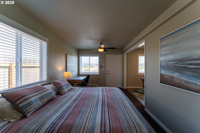 1005 NW Pacific Way, Waldport, OR 97394 - bedroom with baseboards and ceiling fan