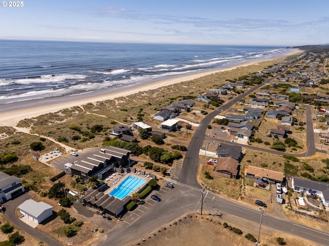1005 NW Pacific Way, Waldport, OR 97394 - aerial view of property and surrounding area featuring expansive beach and a pool