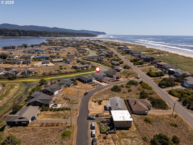 1005 NW Pacific Way, Waldport, OR 97394 - aerial overview of property's location featuring a water and mountain view and nearby suburban area