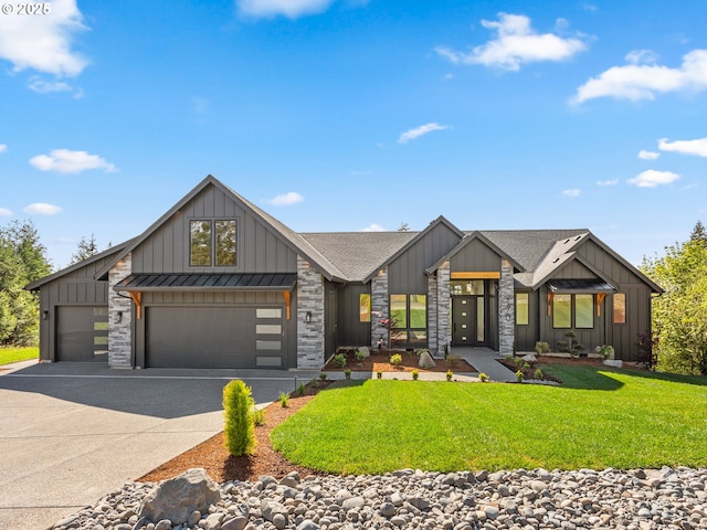 view of front facade featuring a standing seam roof, stone siding, concrete driveway, board and batten siding, and a front yard